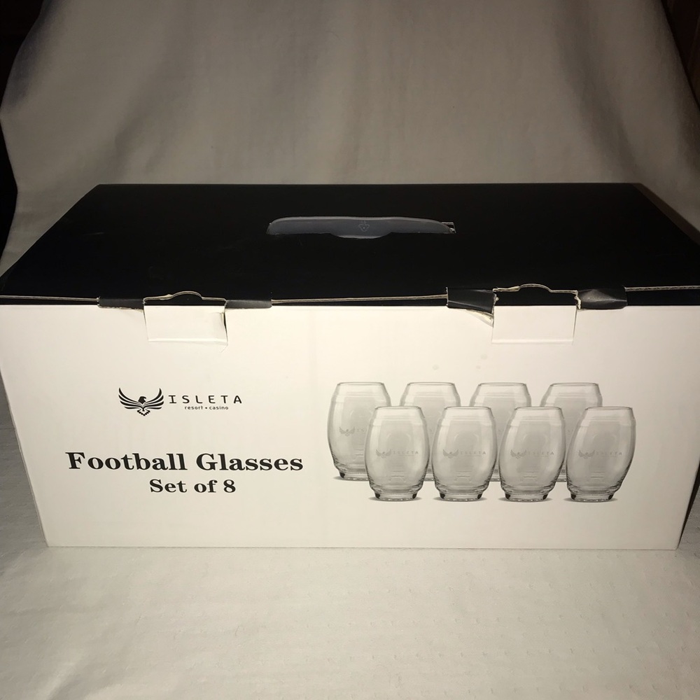 Set of 8 Football shaped glasses new in box.